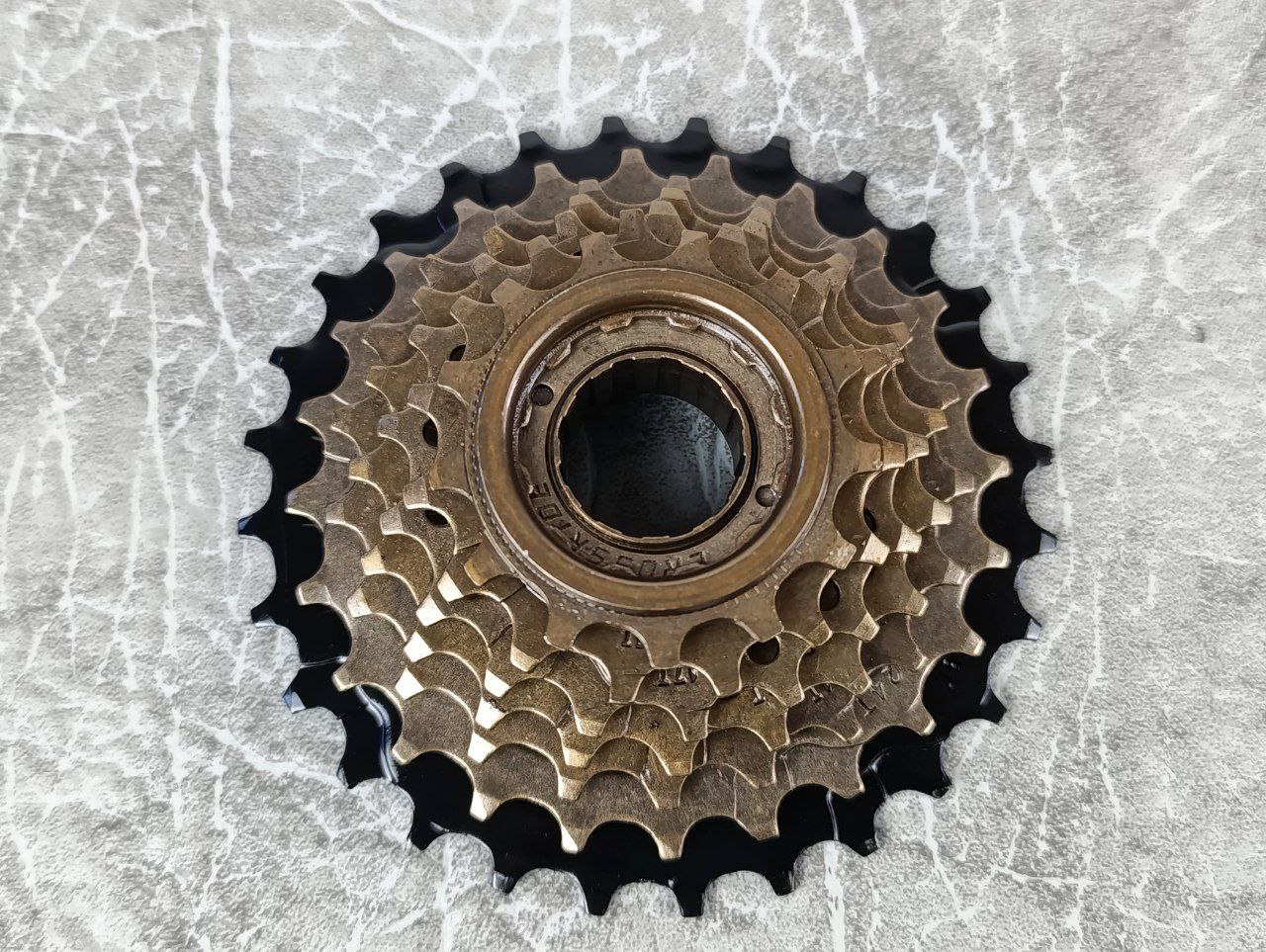 фото - Трещітка Crossride CR-FW7I 13-28T, 7 скор, коричневий