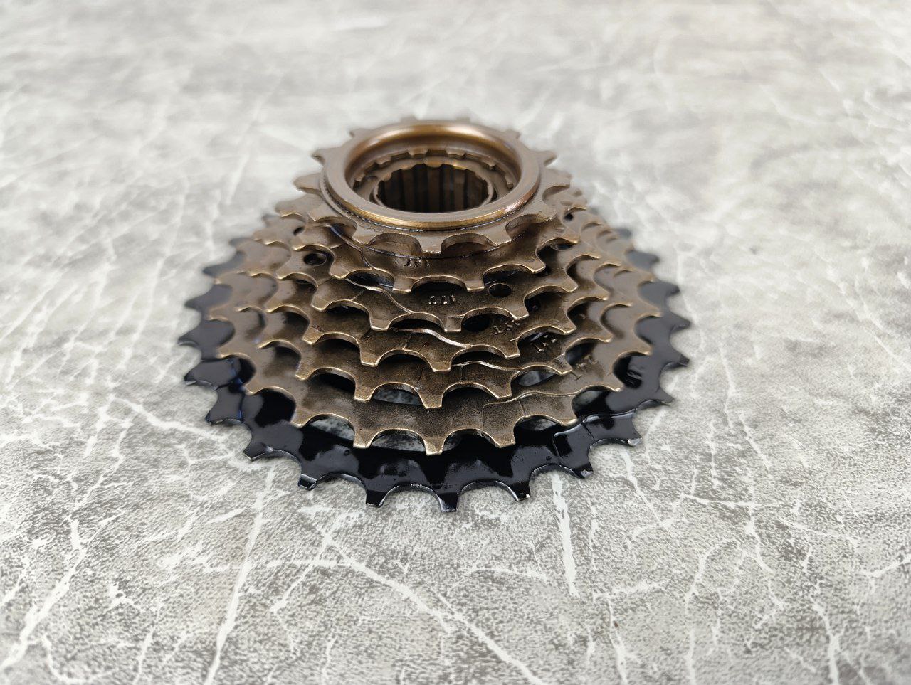 фото - Трещітка Crossride CR-FW7I 13-28T, 7 скор, коричневий