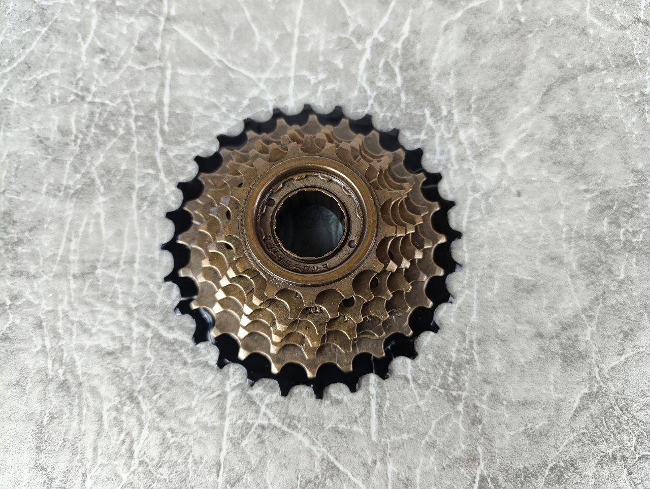 фото - Трещітка Crossride CR-FW7I 13-28T, 7 скор, коричневий