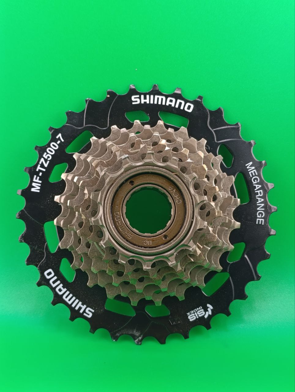Тріскачка 7 скор. SHIMANO MF-TZ500-7 Megarange 14-34T коричневий