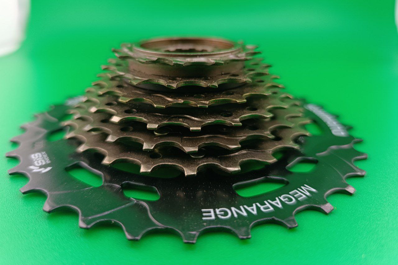 Тріскачка 7 скор. SHIMANO MF-TZ500-7 Megarange 14-34T коричневий